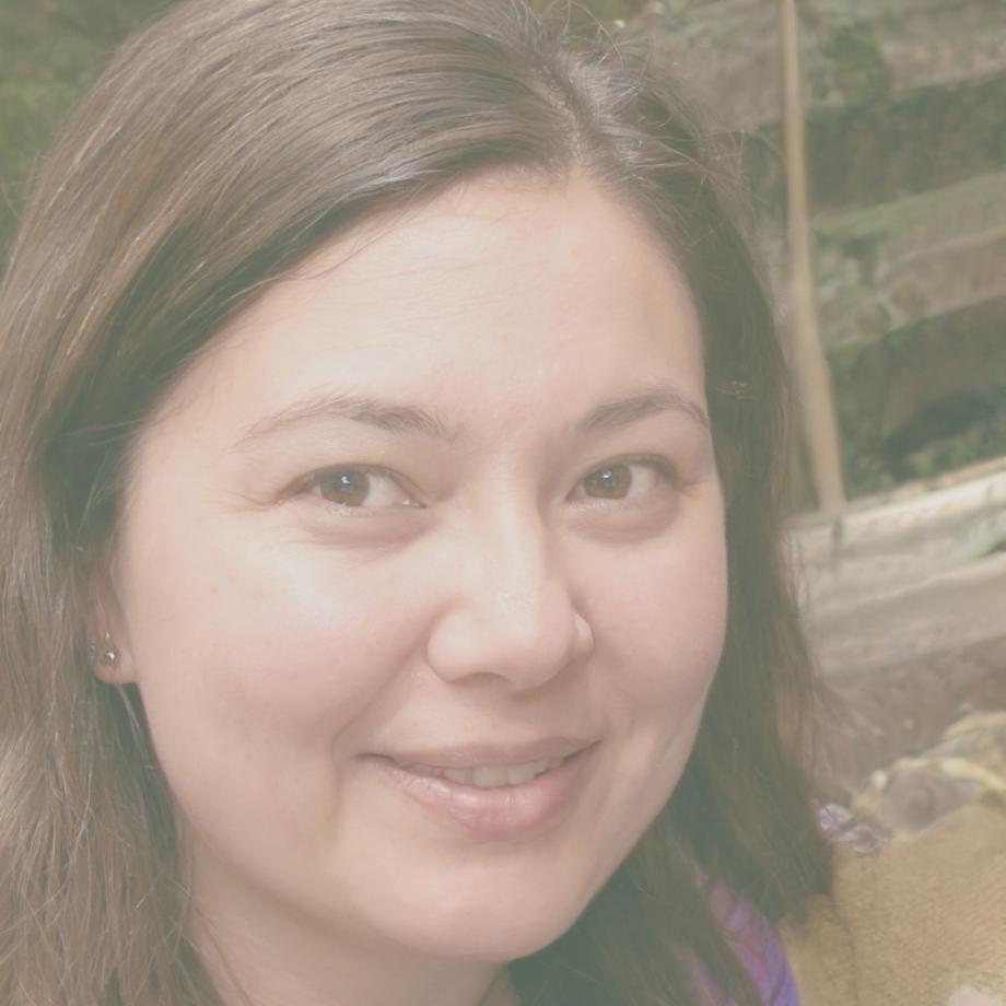 Professional headshot of Maria, a successful blockchain program graduate